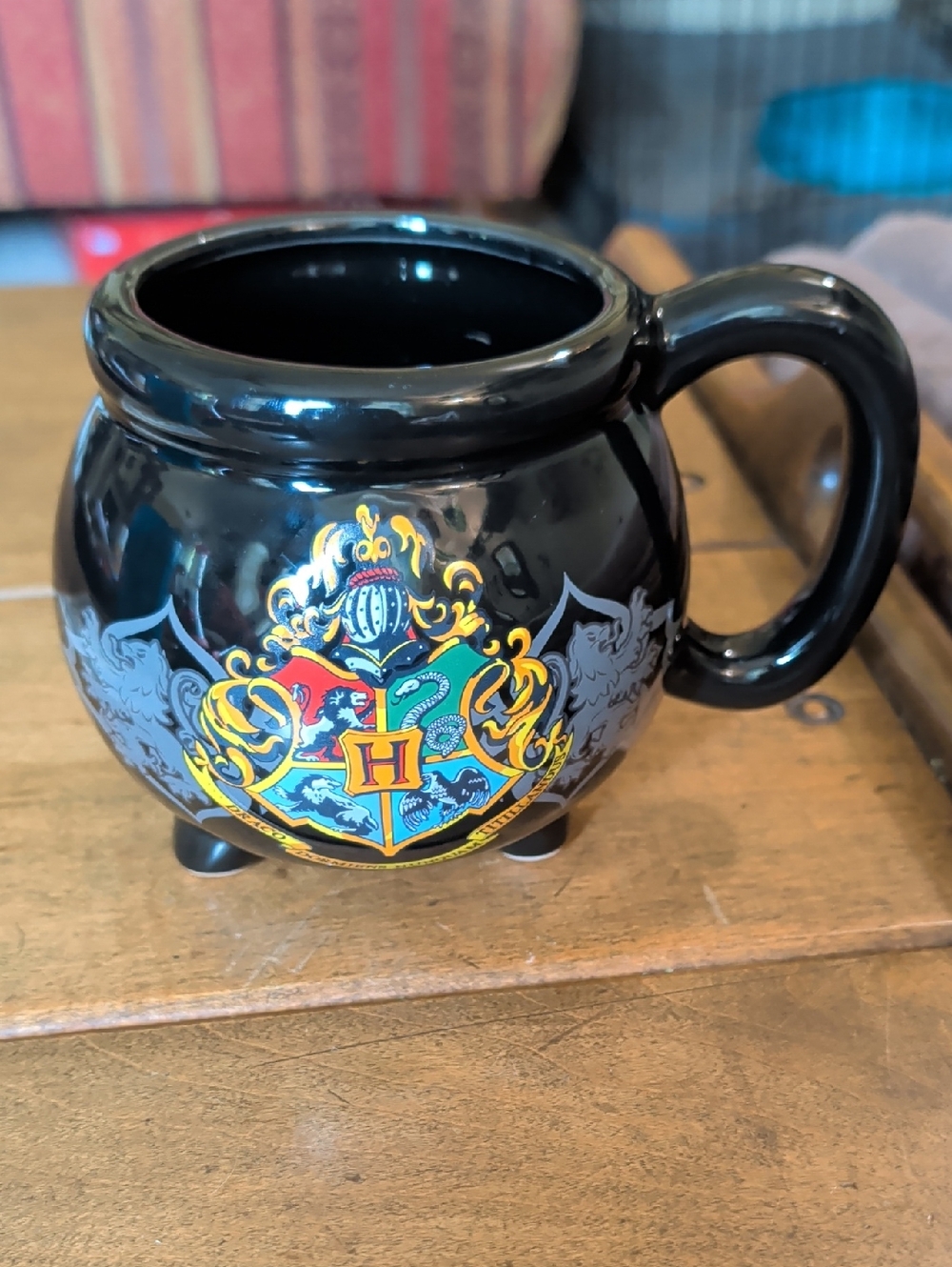 Warner Bros. Black Cauldron Mug with Multicolor Crest